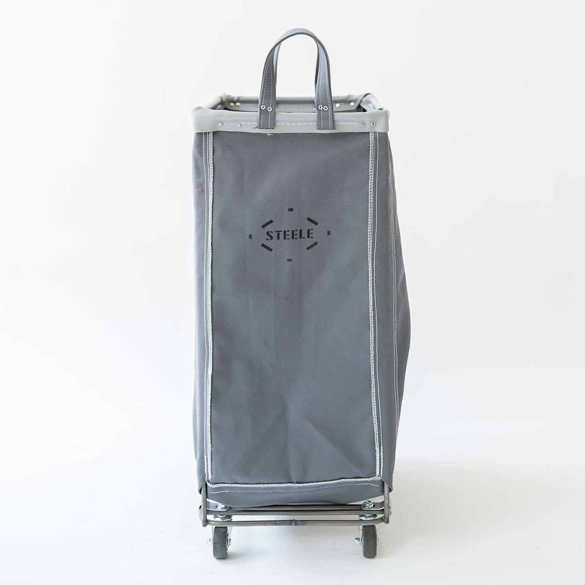 A gray fabric rolling storage bag with a top handle and wheels, featuring a black 'STEELE' logo printed on the front, set against a plain white background.
