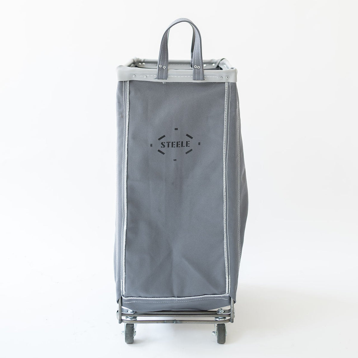 A gray fabric shopping cart with a top handle and wheels, featuring the brand name 'STELLK' printed on the front, set against a plain white background.