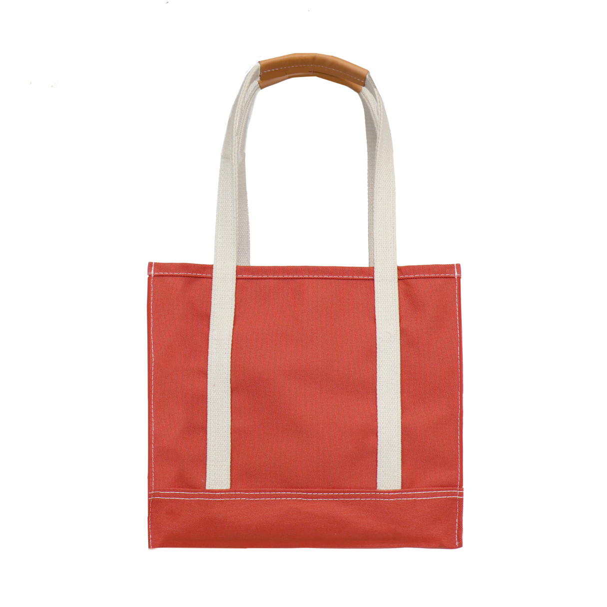 Red tote bag with white handles on a white background