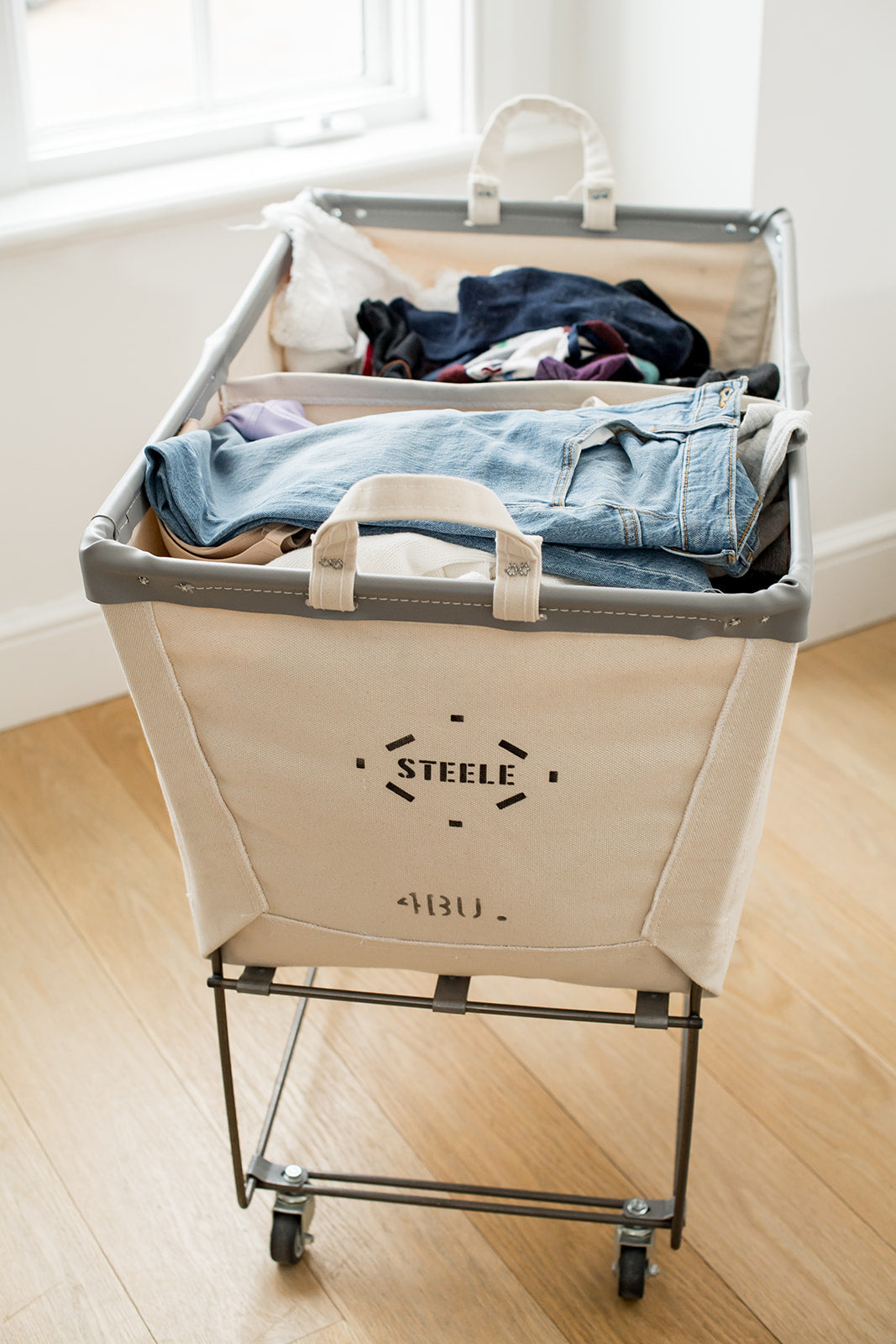canvas laundry cart with 2 internal sections