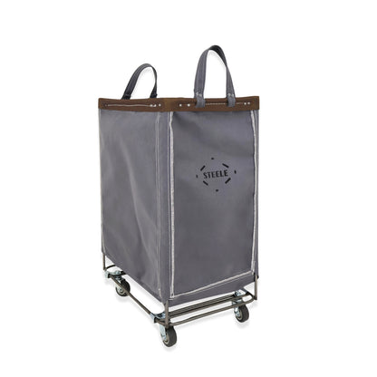 Gray laundry cart with wheels and a Steele logo on a white background