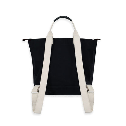 Black tote bag with white straps on a white background